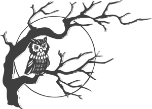 A spooky tree and owl used as halloween window decorations.