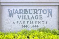 Warburton Village Apartments Sign
