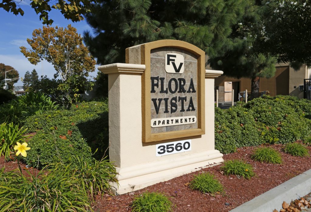 Flora Vista Apartments Sign