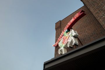 Costume Property Apartments Exterior Neon Sign