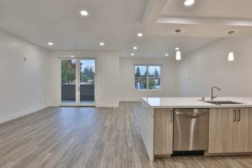 Living Room, Dining Room, Kitchen, and Patio Door View