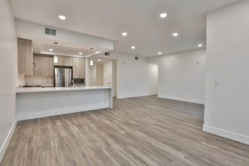 Living Room Area Looking Into Kitchen