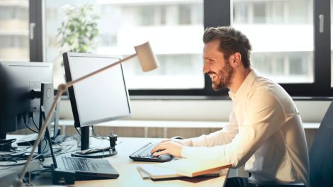 Man happily working for one of the best companies near San Jose