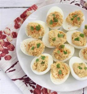 Hummus Deviled Eggs on a plate.